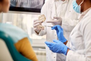 dental model during an appointment with a patient.